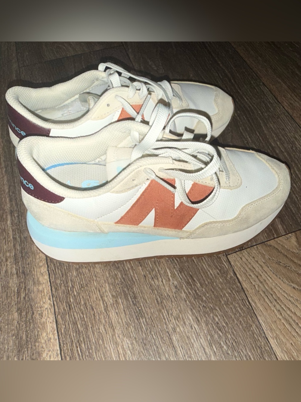 New Balance White and Rust Accent Platform Sneakers